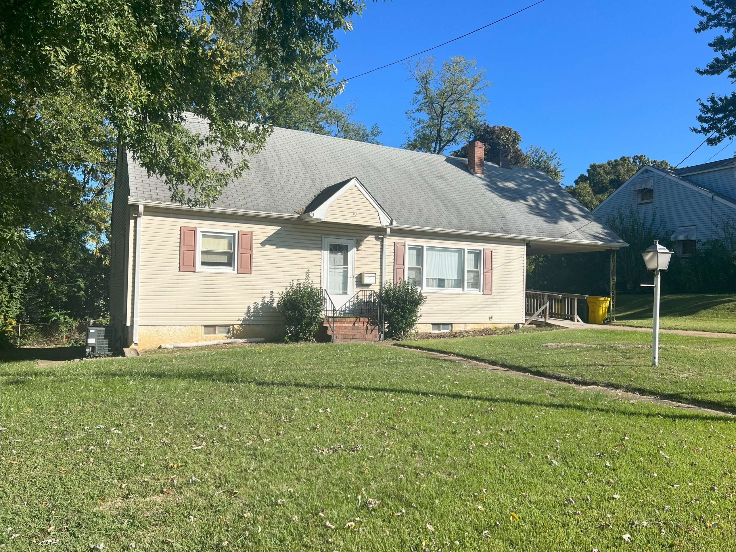A small pale yellow house with a large green yard. We have many homes throughout Anne Arundel county and Glen Burnie, Md 